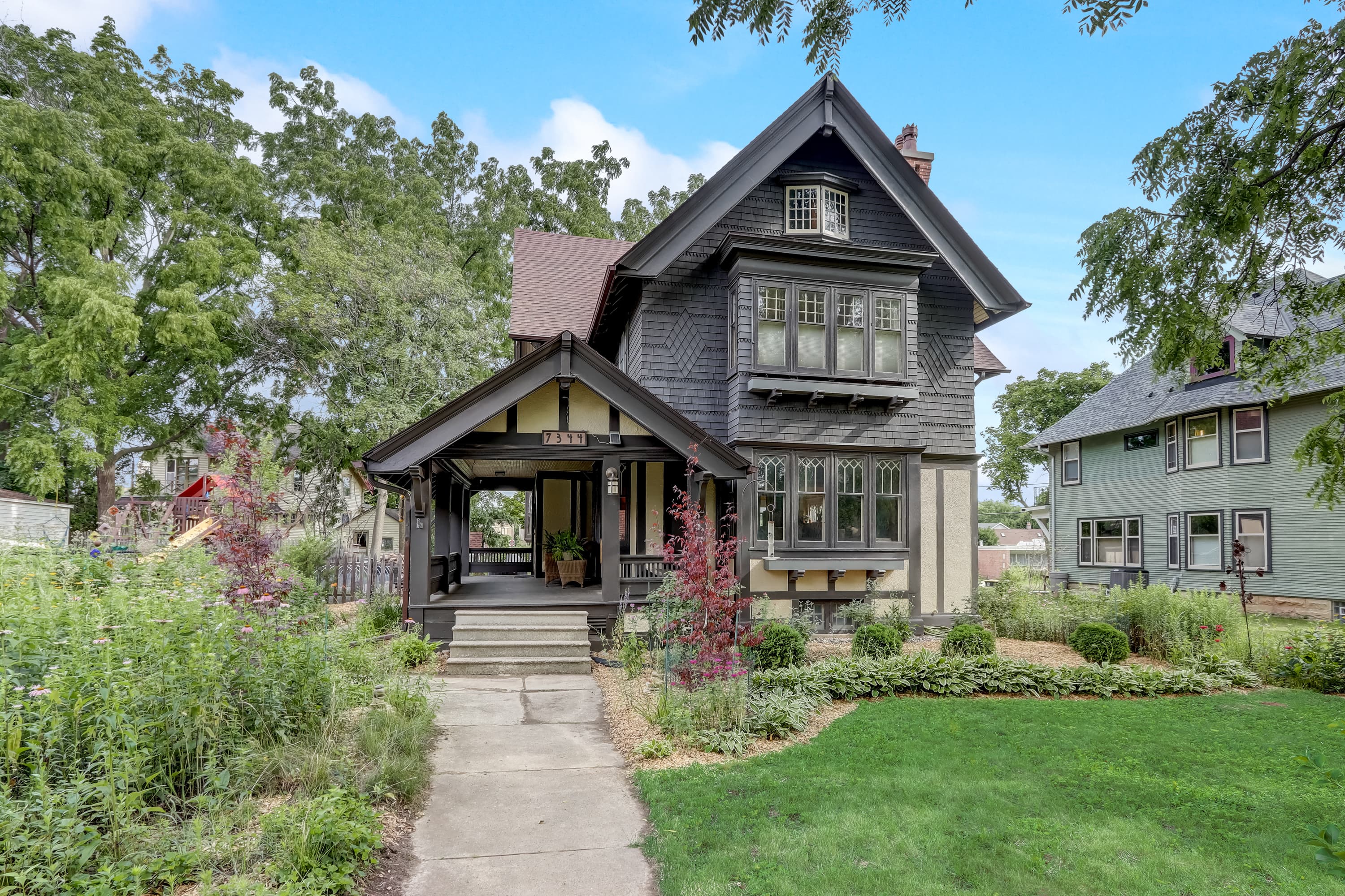 Classic Southeastern Wisconsin home exterior with mature trees